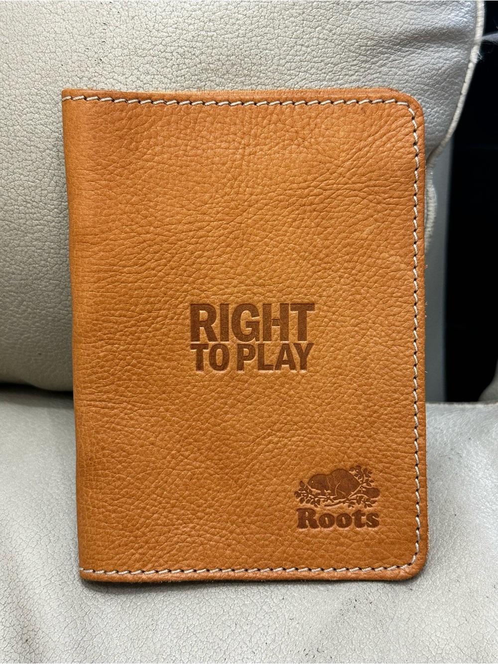 Roots Tan Leather "Right To Play" Passport/Card Holder